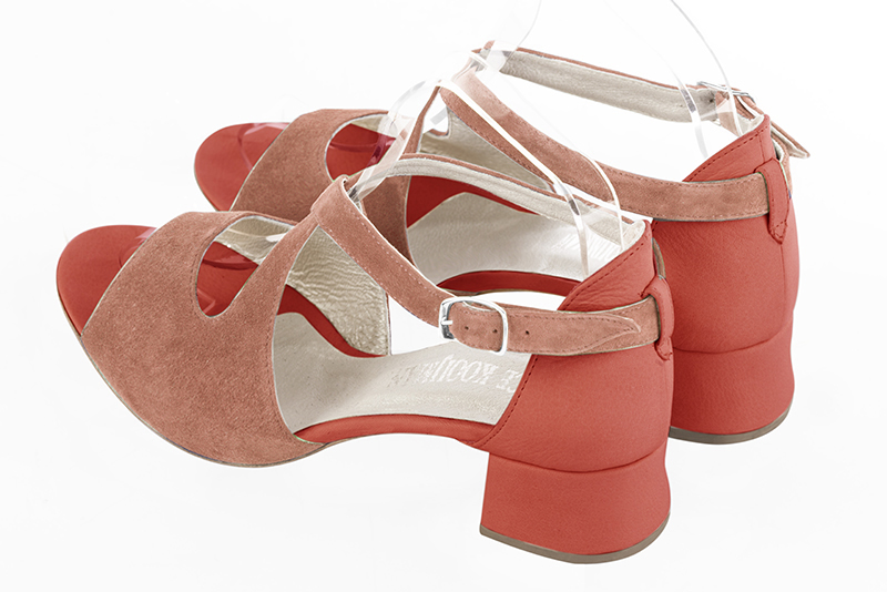 Coral orange women's closed back sandals, with crossed straps. Round toe. Low flare heels. Rear view - Florence KOOIJMAN